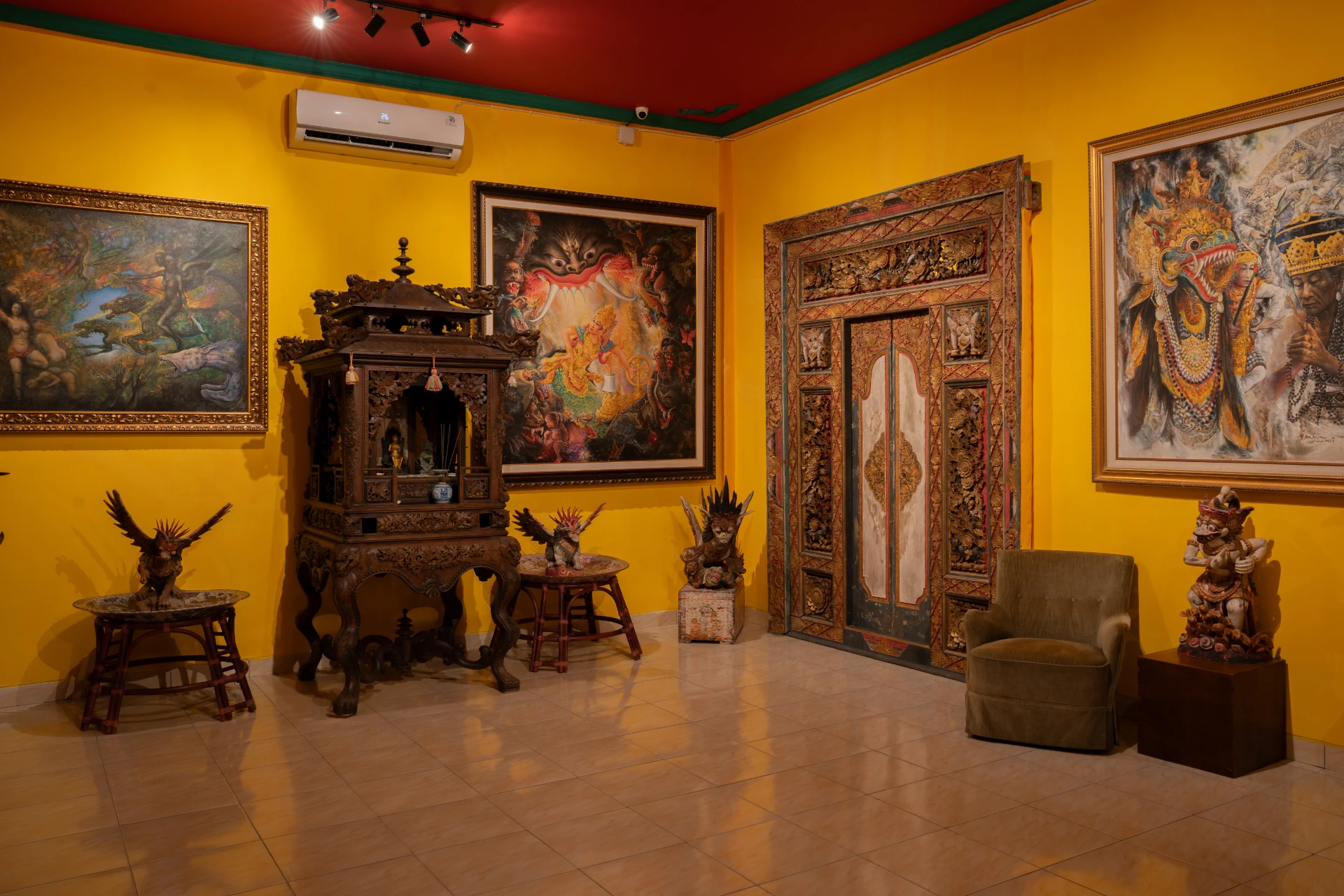 Side View Balinese Bale Gede wooden pavilion with intricate hand-carvings, Museum Peter Bloch Collection.