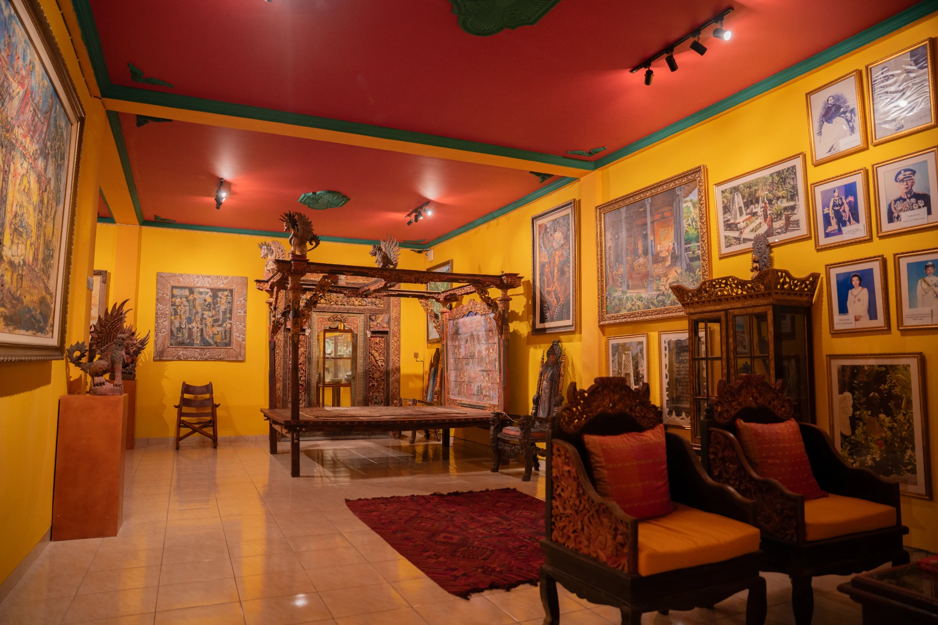 Long Shot Balinese Bale Gede wooden pavilion with intricate hand-carvings, Museum Peter Bloch Collection.